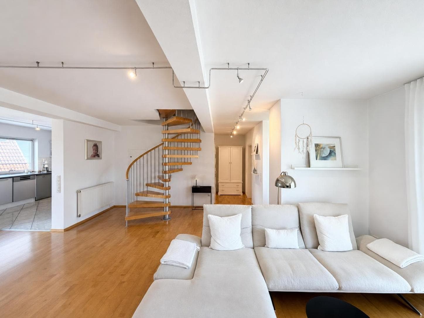 Die Wendeltreppe – markantes Detail mit Maisonette-Charakter.